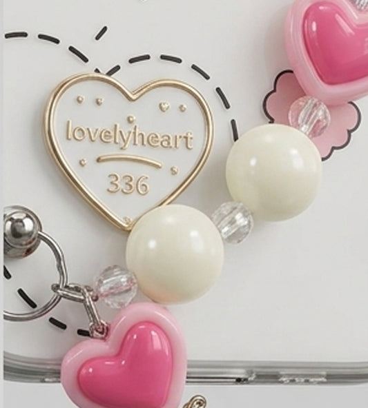 IPHONE 17 SERIES LOVELY HEART CLEAR: 3D RAINBOW ACCENTS, BEADED HEART CHARM, PREMIUM TRANSPARENT PROTECTIVE COVER